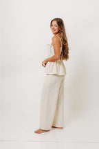 Keira 100% Cotton Bow Trim Peplum Top in Cream