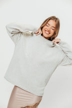 Toni Inside-Out Roll Neck Pullover Sweater in Melange Grey