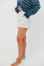 Trevi Ruffle Hem Knit Shorts in White
