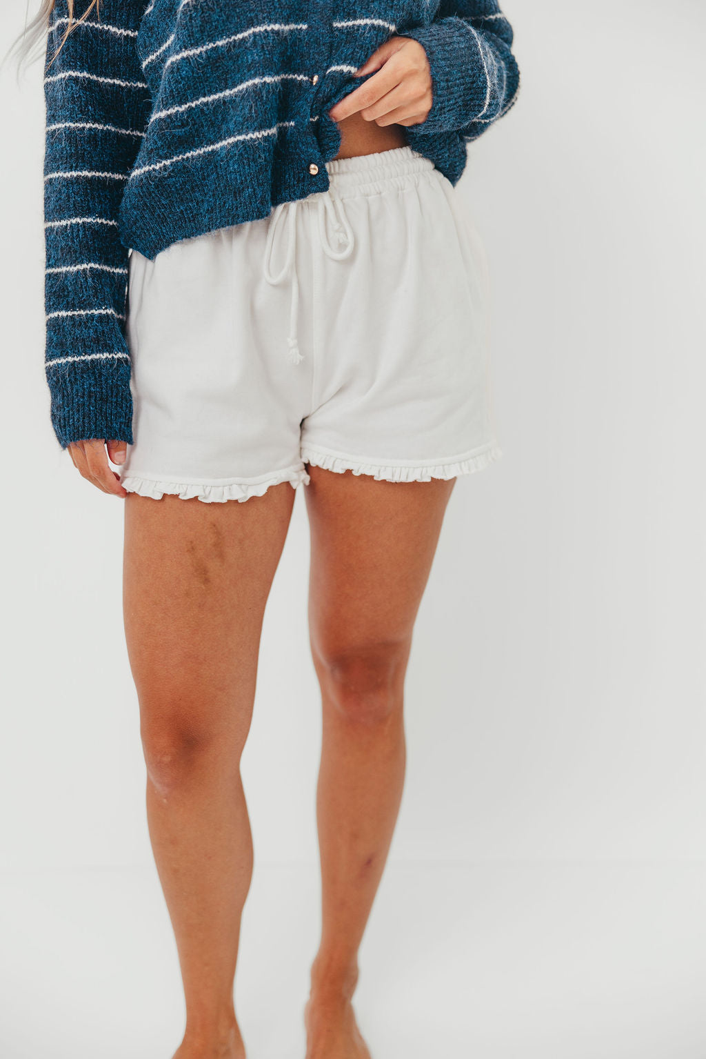 Trevi Ruffle Hem Knit Shorts in White