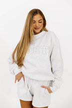 WORTH Tone On Tone Embroidered Mockneck Sweatshirt in Pearl Grey