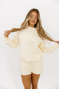 WORTH Tone On Tone Embroidered Mockneck Sweatshirt in Toasted Cream