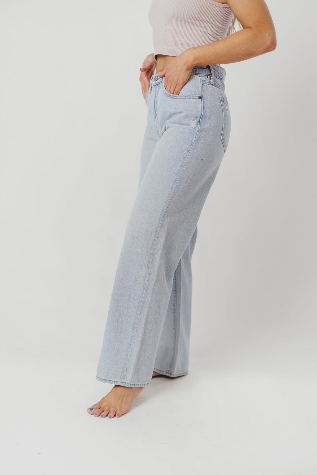 Nori Lightly Distressed Stretch Denim in Light Wash