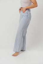 Nori Lightly Distressed Stretch Denim in Light Wash